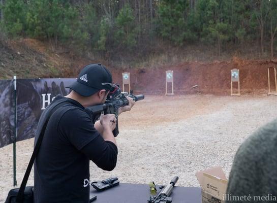 Shooting with a 5.56 AR15, and a casing being ejected, flying out.