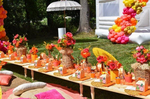 Picnic set up and balloons for Coachella theme