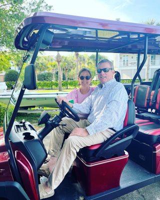 Some happy vacationer's on Sullivan's Island about to take their street legal golf cart on the road