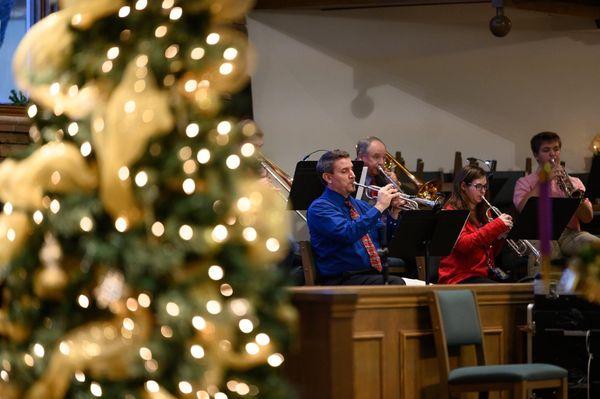 Brass ensemble playing for Christmas Eve worship