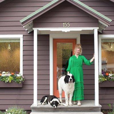 Store Owner, Noa, and her dogs outside the shop.