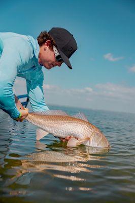 Captain Weston with a redfish