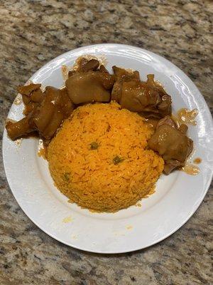 Pig feet with yellow rice/ patitas de cerdo con arroz Amarillo