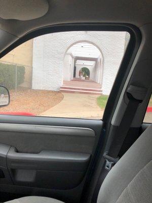 Disabled parking to the left of the office entrance. The grounds are absolutely stunning. A great place for education!!!