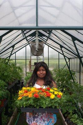 As part of Hayground's seed-to-table curriculum, students dig into the school's organic gardens and greenhouses.