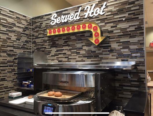 Here "Served Hot" means they warm your cold donut in this oven (sad face emoji)