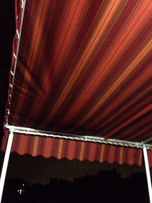 Awning sagging due to collective rain on top