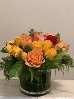 Mixed Roses, Aspidistra, Ming Fern,Salal in Short Glass Cylinder Vase