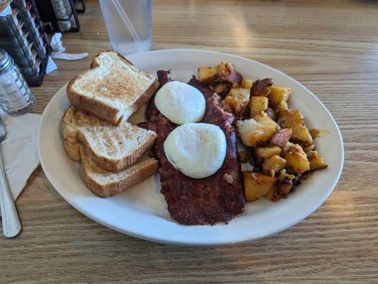 Corned beef hash with poached eggs and hash browns