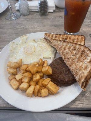 Egg sausage, home fries, wheat toast