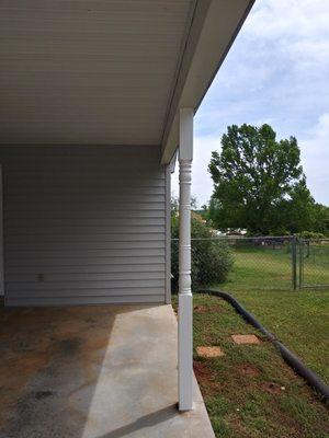 Removal of old wood post and install of new vinyl load bearing post with steel inserts