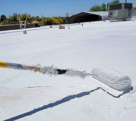 Applying the best coating to a roof in Oro Valley - Tucson Rubberized 7000 is the best coating on the market! Call us for a free estimate!