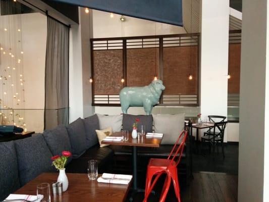 A blue sheep watches over you during your dining experience.