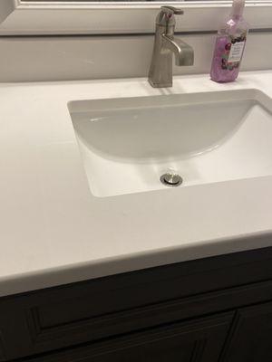 Bathroom vanity top with back splash and side splash.