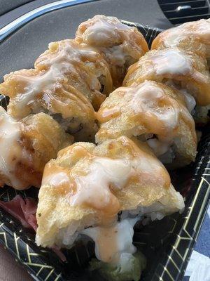 My ABSOLUTE favorite! Crabstick tempura roll.. it's crabmeat with cream cheese fried in a tempura batter..I get mine with no eel sauce!