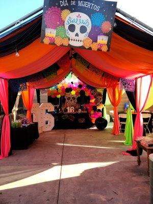 Dia De los Muertos Sweet 16 complete setup done by Phantasmic Events. That includes draping, dessert table,  balloon garland and more.