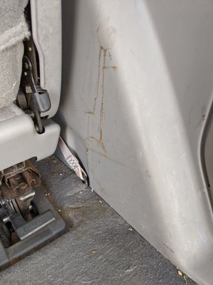 Dirty hatch side panel clearly untouched by cleanser or cloth