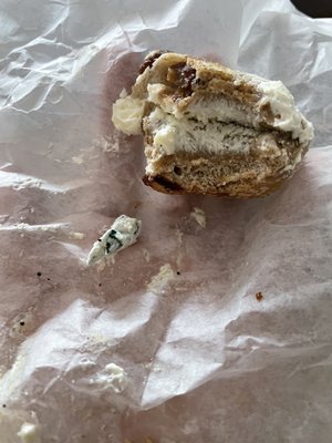 Cinnamon raisin with plain cream cheese and a gum wrapper. You can see that the gum wrapper is coated in cream cheese.