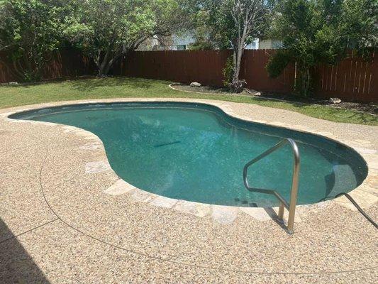 Pool after second week of cleaning.  This was the only week with noticeable improvement though still a lot left.