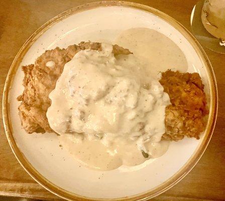 The colossal & simply pristine & best chicken fried steak of my lifetime!  Perfection, no salt or pepper needed!