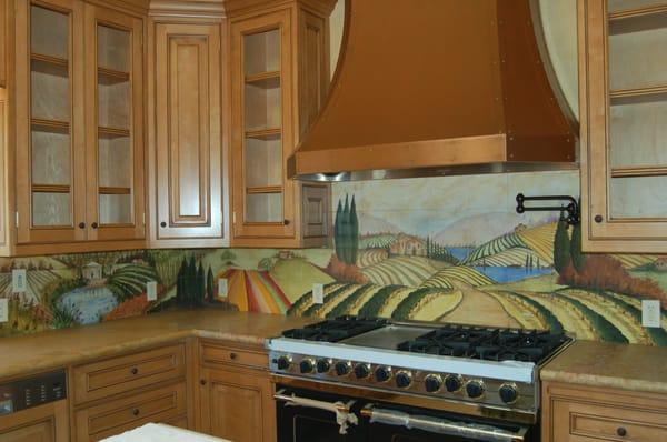 Kitchen counter with hand painted tile backsplash