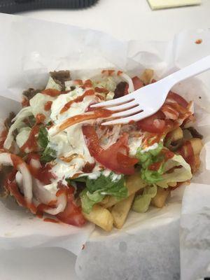 Gyro fries I topped with siracha $7