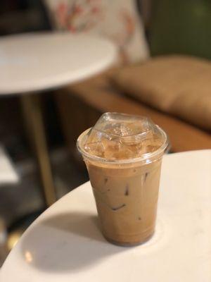 "White widow" signature CBD iced latte with brown sugar and white mocha