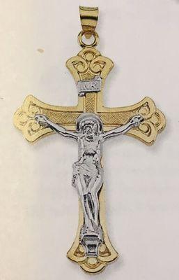 14k gold crosses are available and also white gold and sterling silver