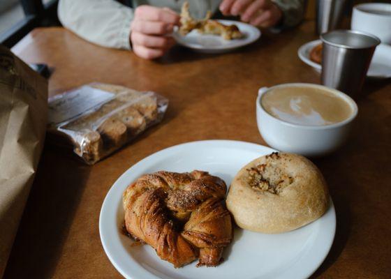 Swedish cardamom buns, garlic-onion sourdough bialys, biscotti, whole wheat sourdough