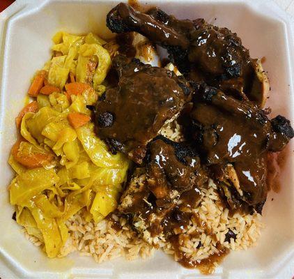 Jerk Chicken Served with Rice & Beans and Steamed Cabbage