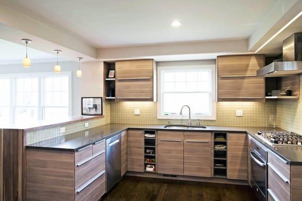 Warm Woods.. Dark grey Quartz counters & olive tile