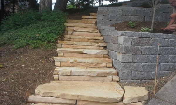 Turn a steep hill side into level shelves with a solid walk-way to have access to portions of your landscape.