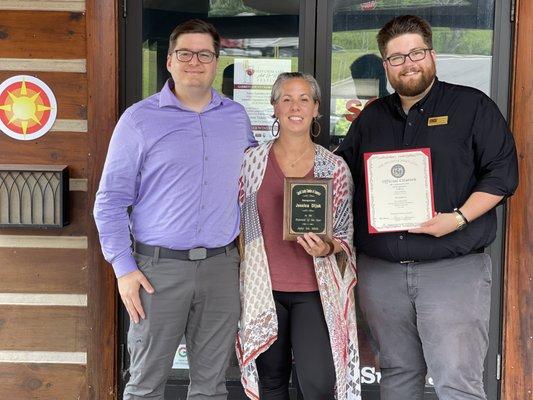 Garrett County Chamber of Commerce. Nick Sharps and Connor Norman present Jessica Dijak of Solnet Web Design with Diplomat of the Year Award