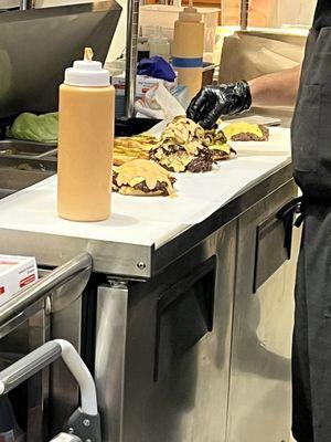 Watching them make these terrific burgers.