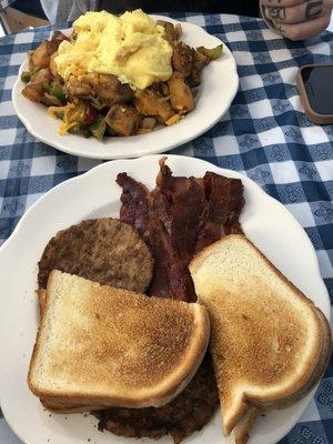 Dishwasher with scrambled eggs  Side of sausage and bacon