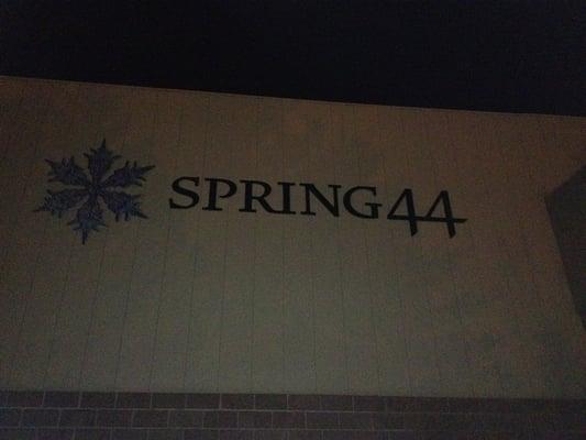 Nighttime photo of the sign.