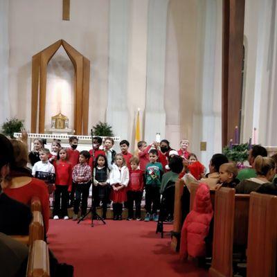 Rehearsal for the Children's Christmas concert! My grandson is making a heart shape! #holycrosschurch @yelpdc #christmas