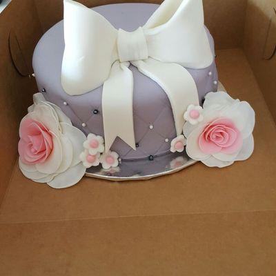 This cake was created for mother's day. It's fondant with little edible pearls.