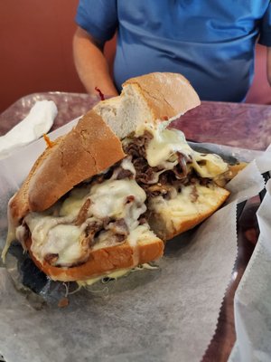 8 inch Steak and Cheese with Mushrooms and Onions!  This was the small sandwich!!   It was amazing and enough for 3 people!!