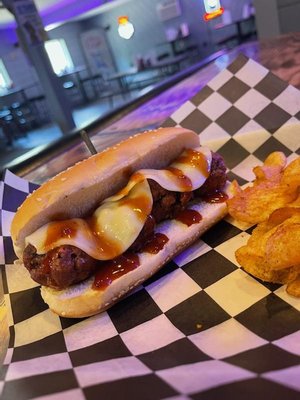 Meatball sub with provolone cheese and house BBQ