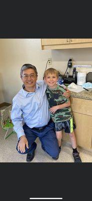 Dr. Wang and my son, Caleb on the day he completed his dairy OIT program