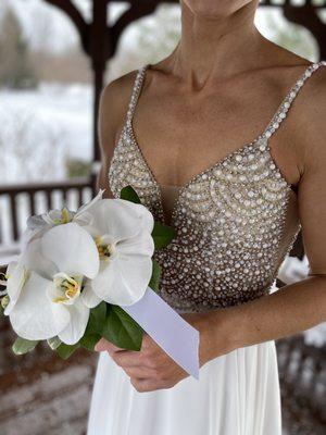 Orchid and white rose wedding bouquet