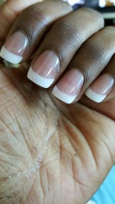 This is the bull crap that was done to my nails... This is NOT pink and white and the acrylic was poorly applied. Just UGLY!