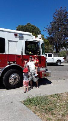 The fire fighters coming to visit for our daughter's birthday.  She loves fire fighters and has a fire fighter costume.