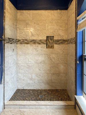 We covert a tub to Beautiful shower with a shampoo niche.
Happy customer in Sienna Plantation.