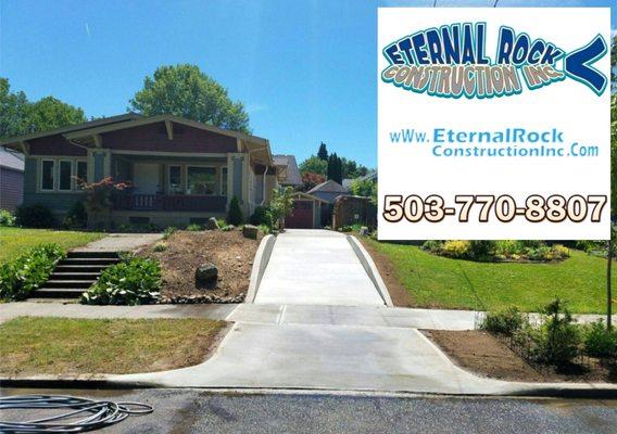 New Concrete Driveway, Retaining Walls, Sidewalk and Approach.