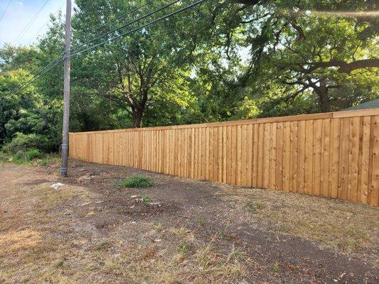 Cedar board on board privacy fence.