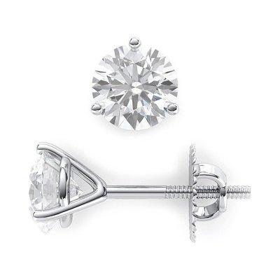 This classic pair of matching earrings features two round brilliant cut natural diamonds...