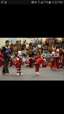 Jr. Instructor Nicholas Berry instructs young sparring partners