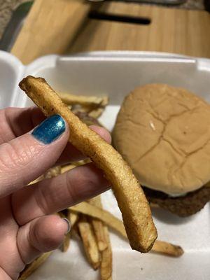 Home fries that were seasoned perfectly! The burger in the back ground is huge even though it doesn't look it in the picture!